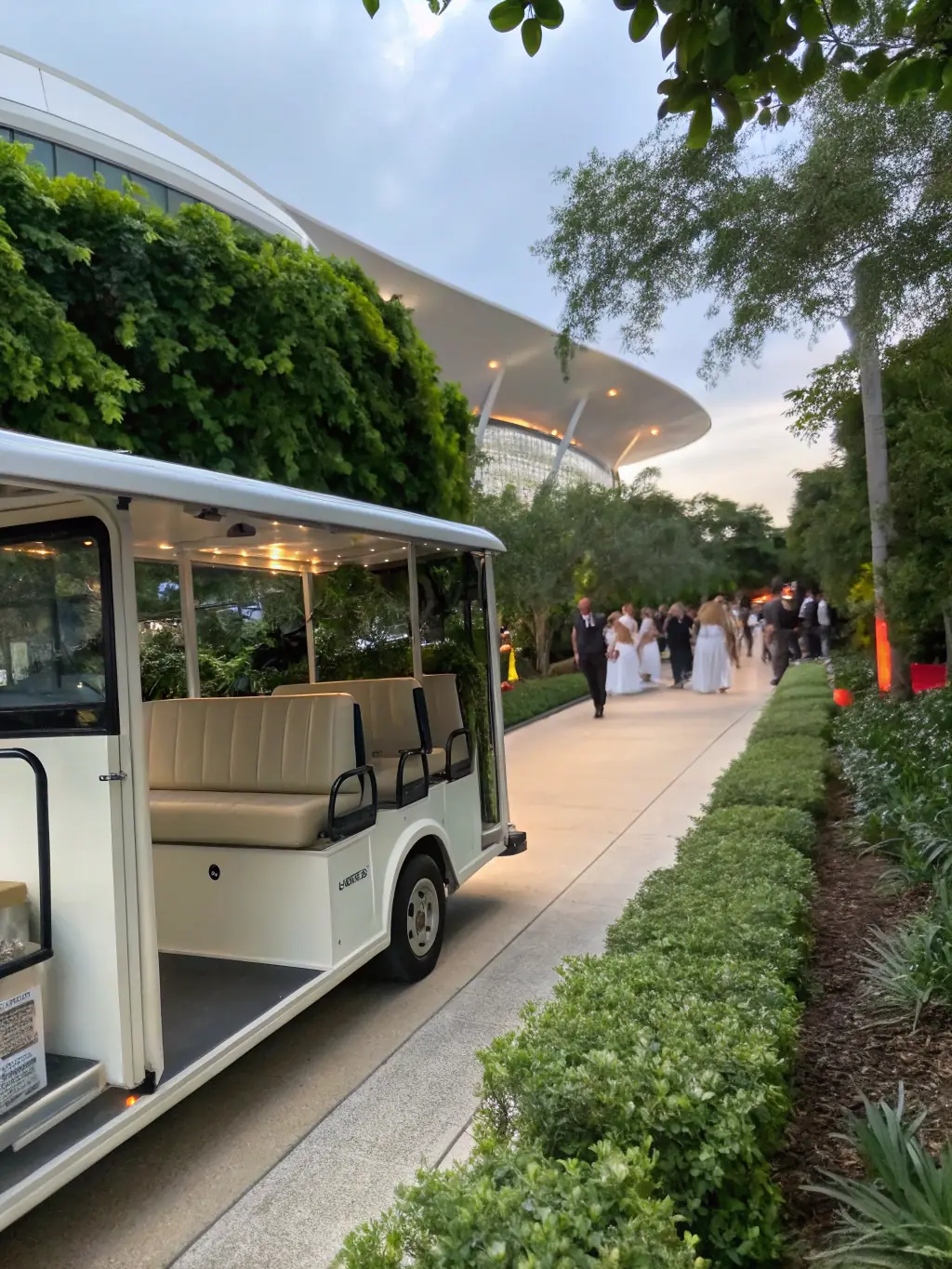 A modern, large-capacity shuttle bus with tinted windows, sleek exterior, and a professional appearance, representing Luxury Fleet's corporate event shuttle service.